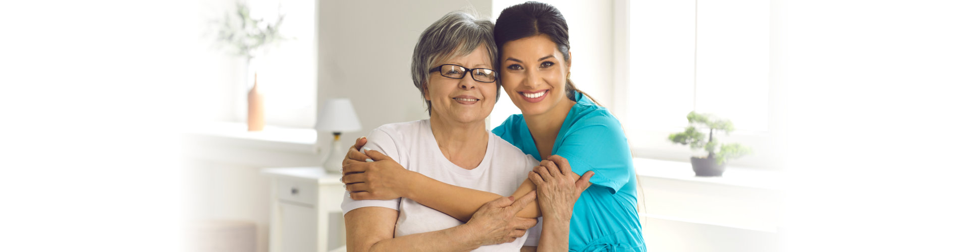 young woman embracing old